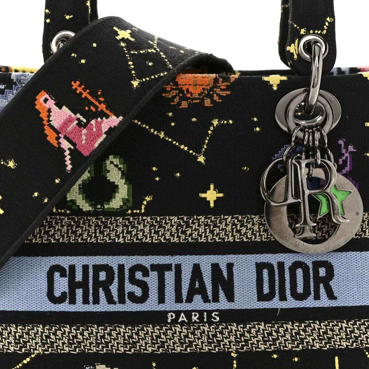 Black embroidered canvas handbag front with Christian Dior PARIS band and silver charm hardware