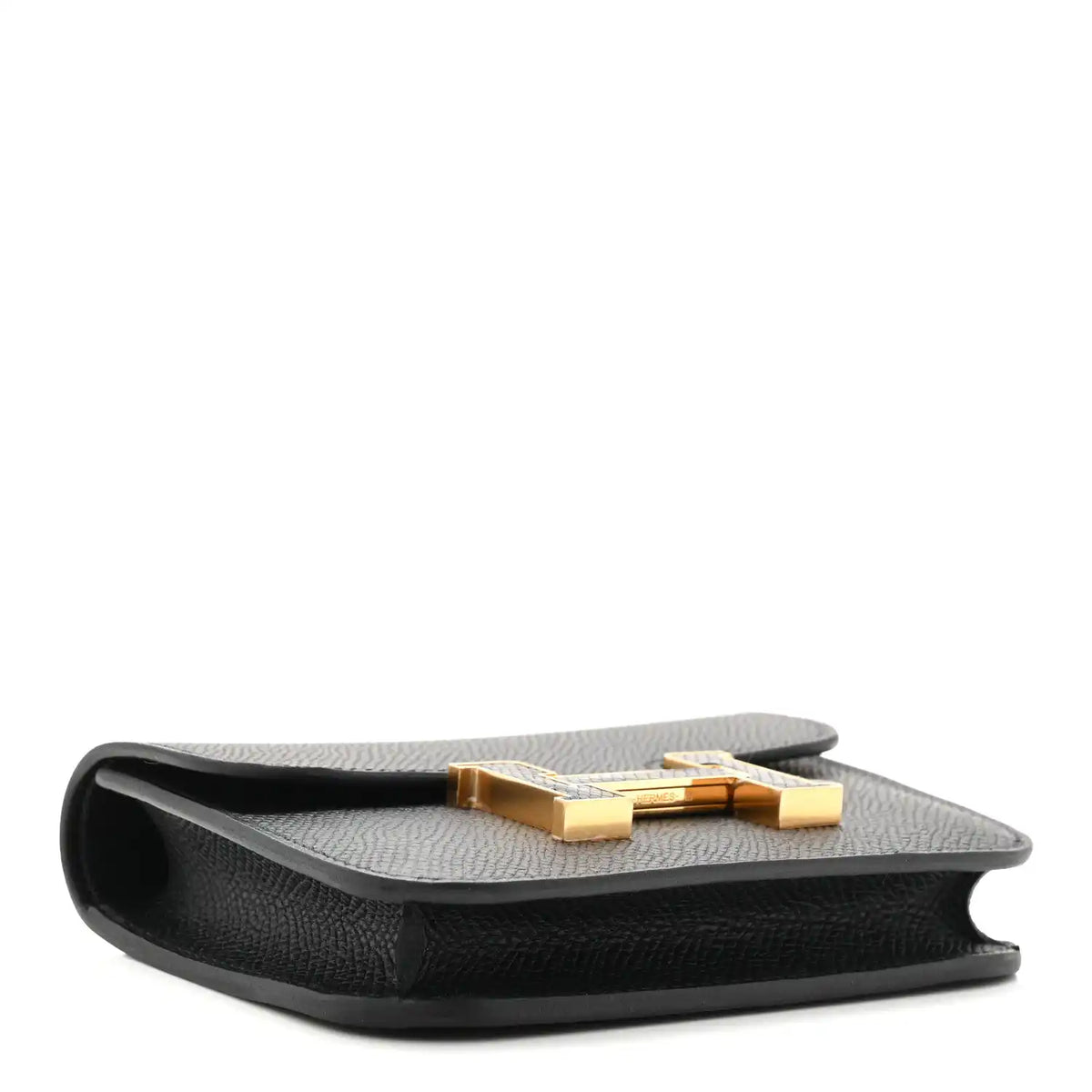 Black slim wallet showing interior lining and gold pushlock closure