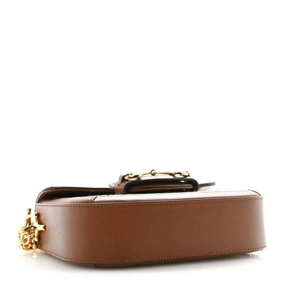 Mini shoulder bag with brown leather exterior and gold-tone top handle hardware