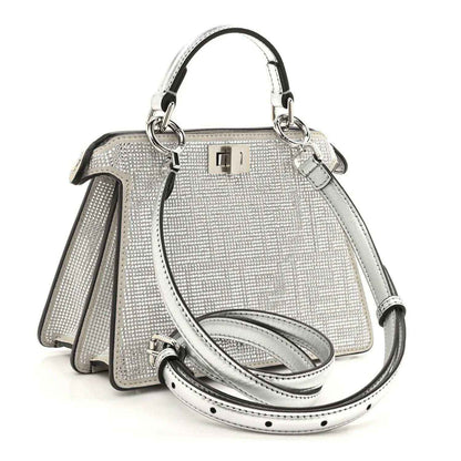 Silver crystal satchel with silver-tone hardware and adjustable crossbody strap