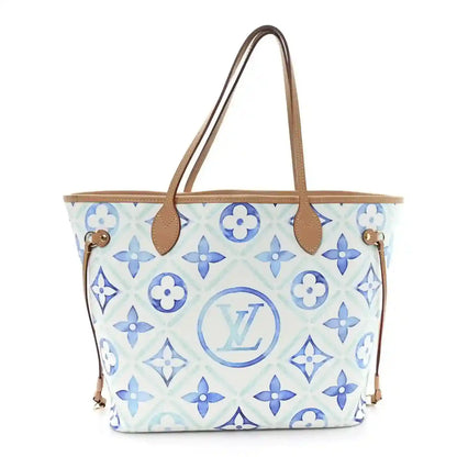 Louis Vuitton Neverfull tote in blue monogram tile print with tan leather handles