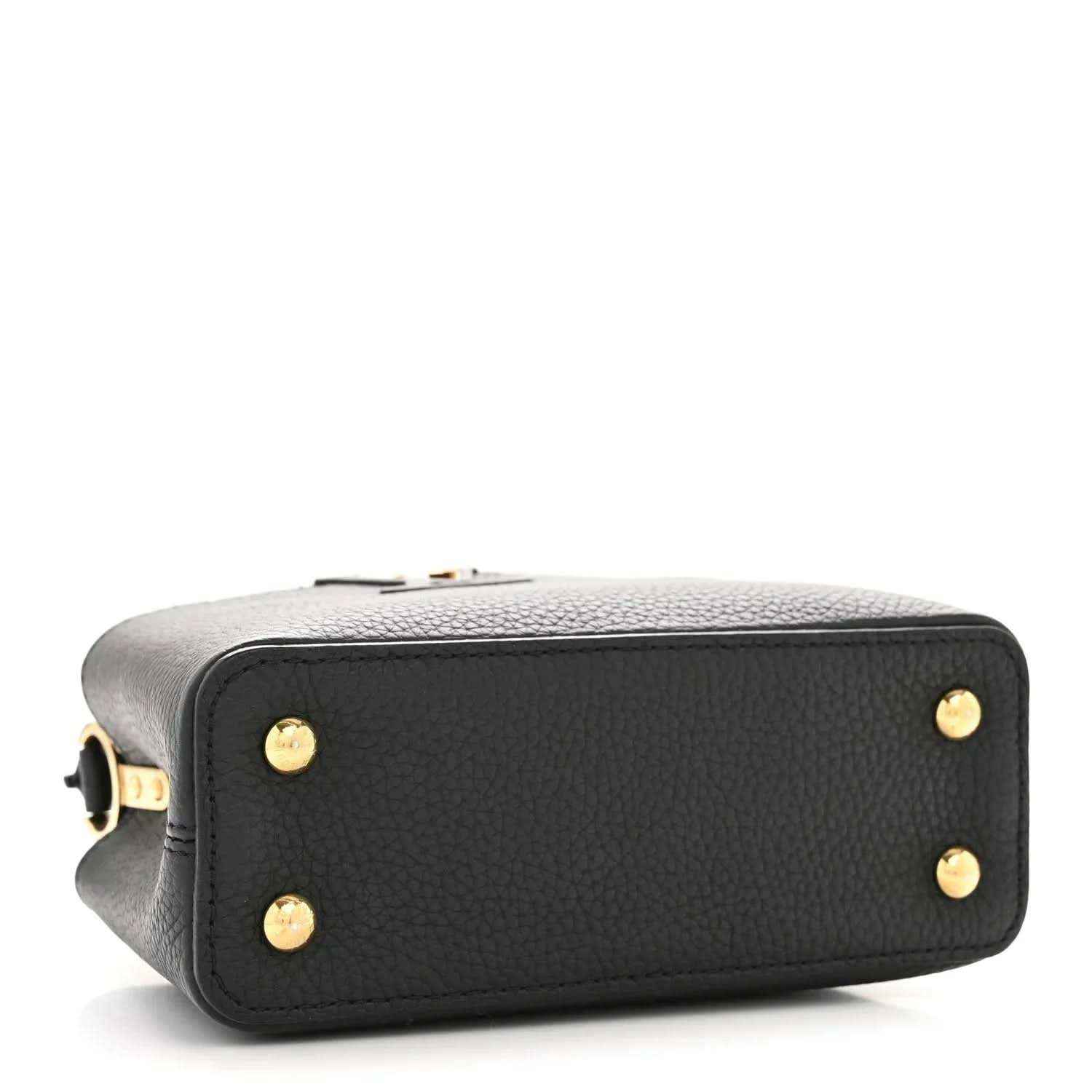 Black textured leather mini bag with gold-tone corner studs and top closure hardware