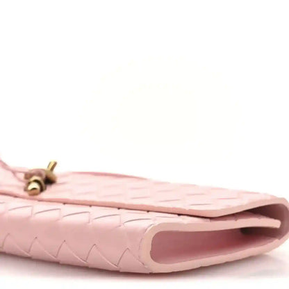Bottega Veneta Rose pink nappa clutch interior pocket and gold clasp base