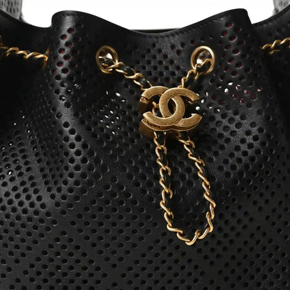 Small black perforated handbag with gold chain drop and CC emblem