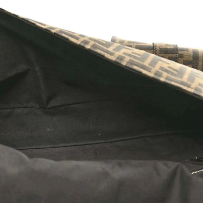 Baguette bag interior lining near top edge, dark fabric with Zucca trim.