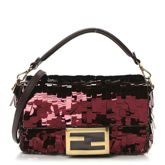 Mini baguette handbag with red sequin front, gold-toned hardware, and top handle straps