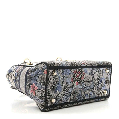 Christian Dior embroidered denim bag with striped trim and metal studs