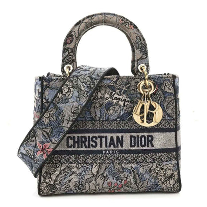 Christian Dior embroidered denim tote bag with top handles and gold hardware
