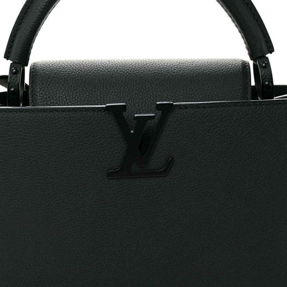 Matte black leather handbag front with LV monogram and structured top edge