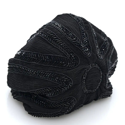 Black beaded pochon bag with scalloped side panel and intricate broderie stitchwork