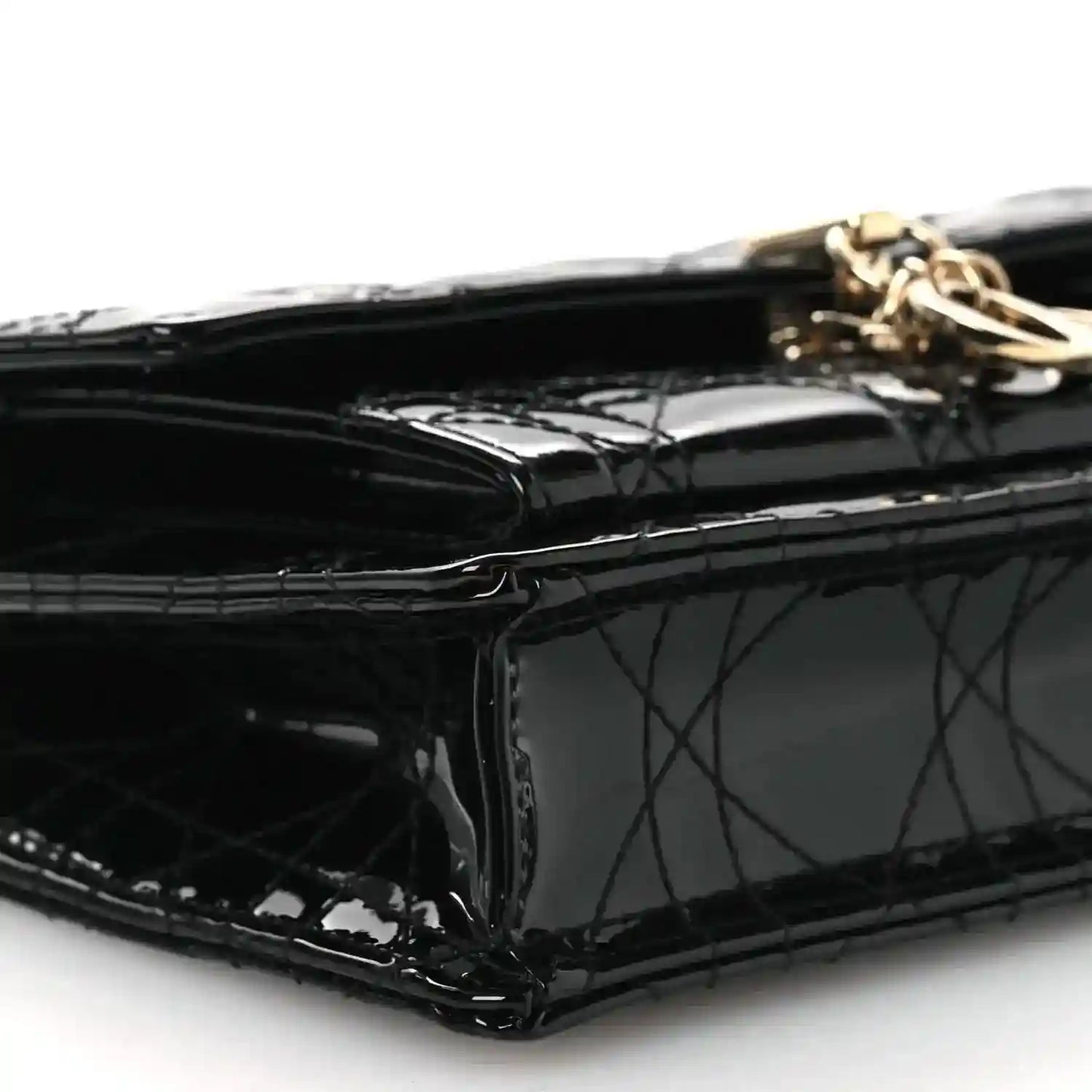 Black patent Cannage Lady Dior chain pouch, gold top hardware close-up