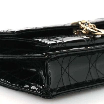 Black patent Cannage Lady Dior chain pouch, gold top hardware close-up