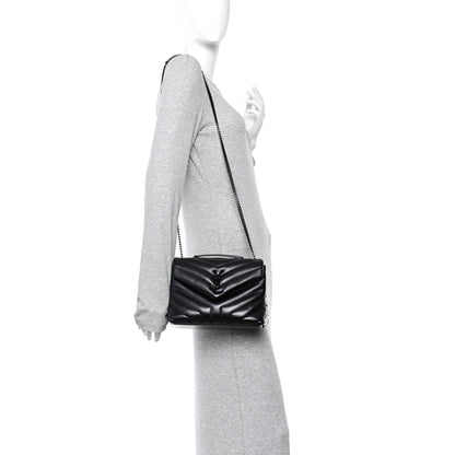 Black quilted mini satchel with chain strap