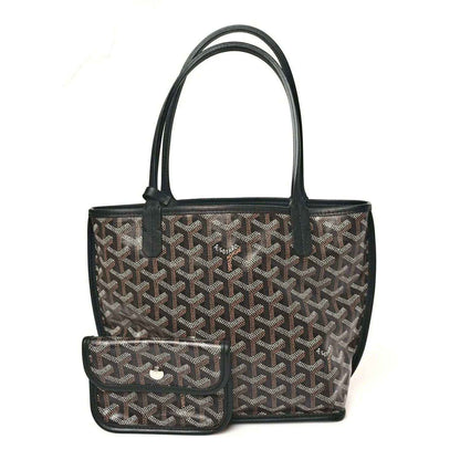 Goyard monogram reversible mini tote bag with front flap pocket and black handles.
