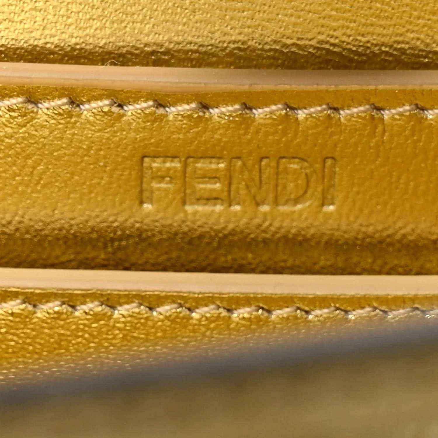 FENDI embossed on gold leather satchel edge with stitched trim detail