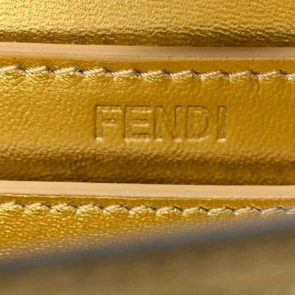 FENDI embossed on gold leather satchel edge with stitched trim detail