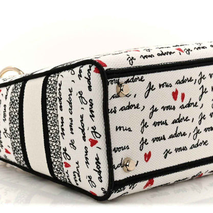 Medium Lady D-Lite bag end panel with black trim and Dioramour hearts pattern