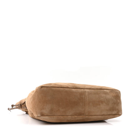 Suede medium tote bag with rounded base, chain handles, and side ties