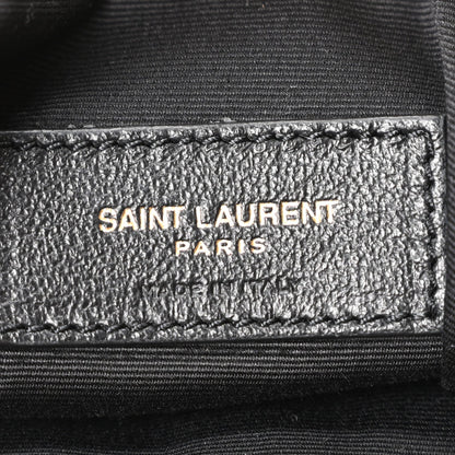 Saint Laurent Paris logo label on interior lining of suede tote bag