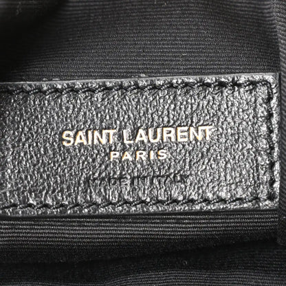 Saint Laurent Paris logo label on interior lining of suede tote bag
