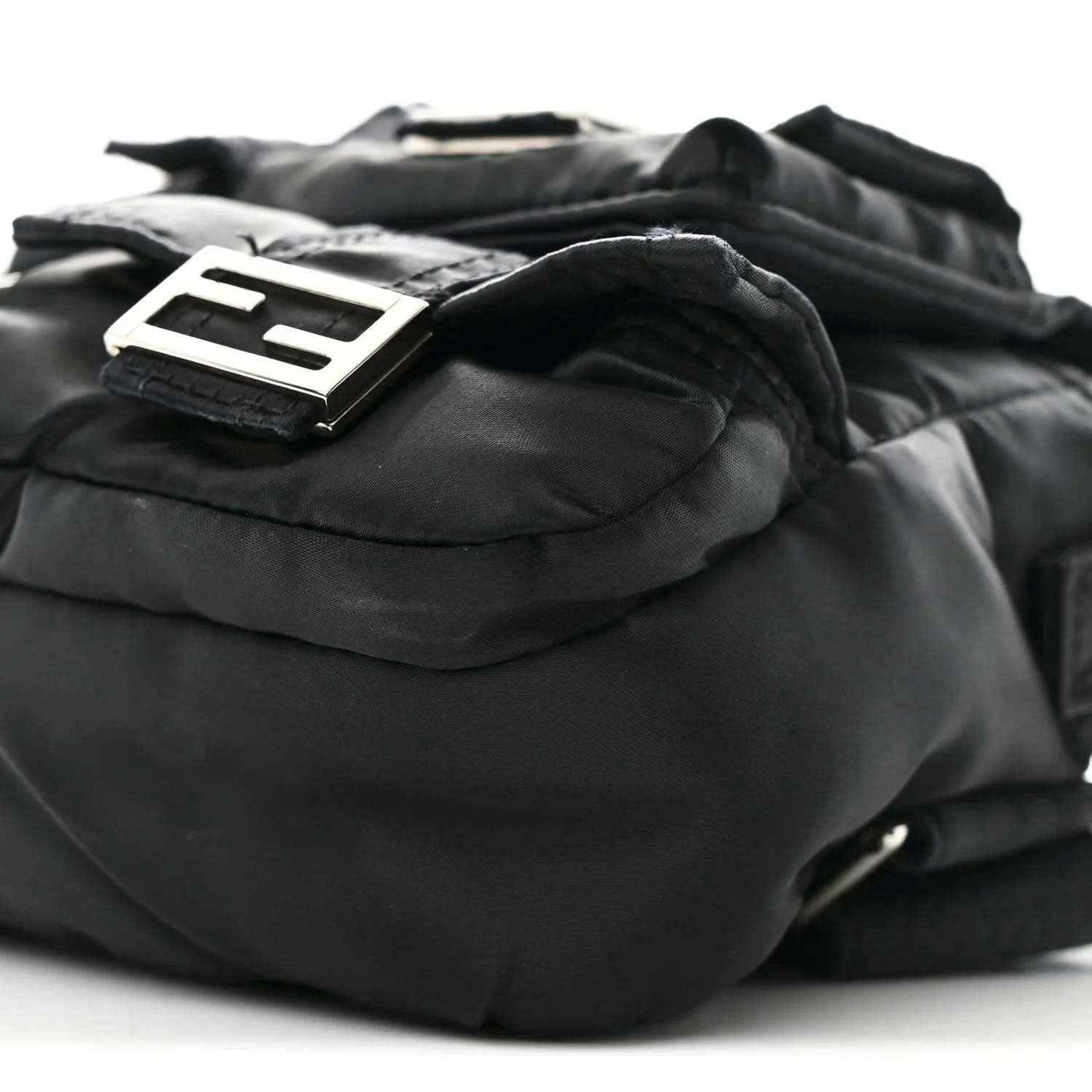 Fendi Econyl black nylon bag close-up showing logo patch on front fold-over flap
