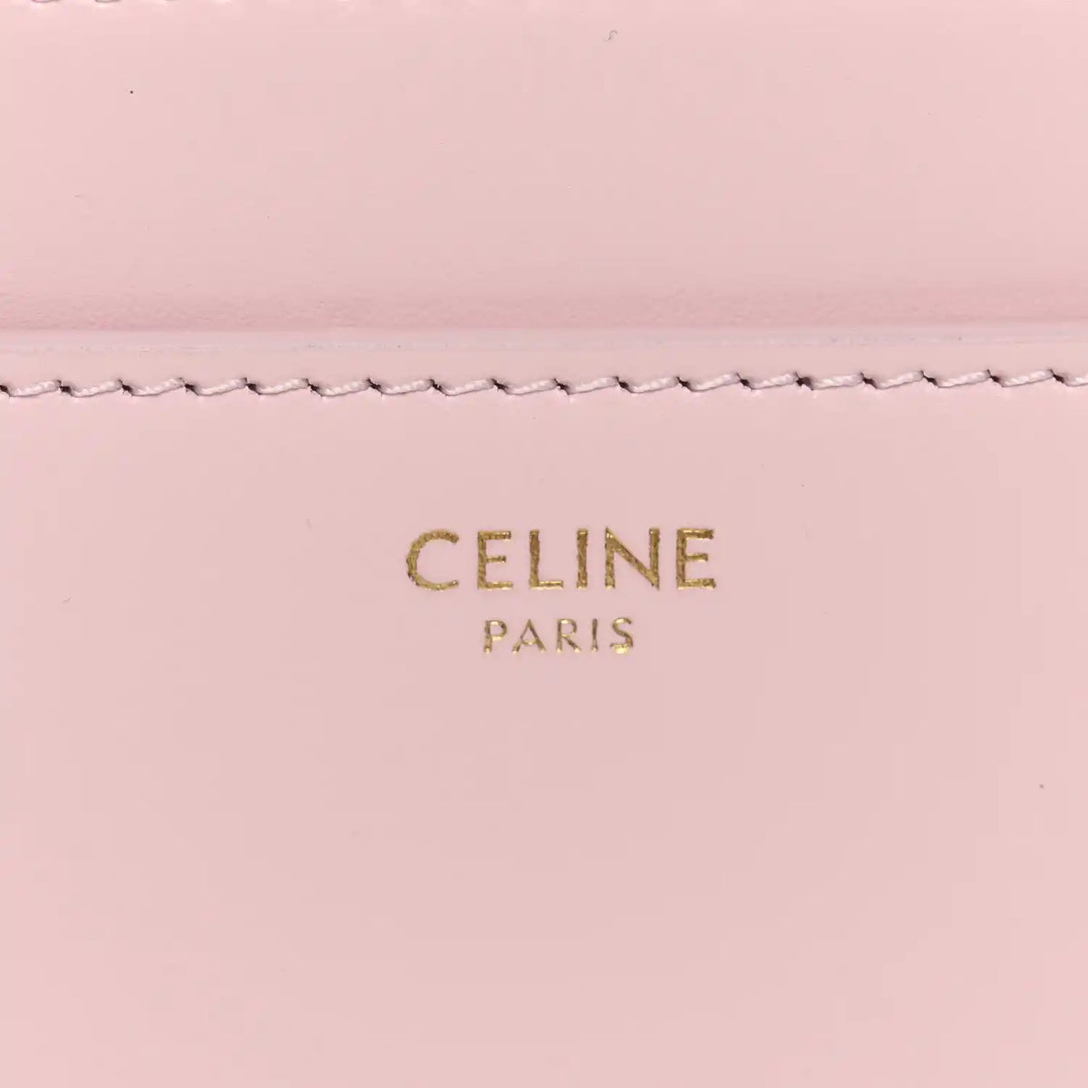 Pastel pink leather mini bag panel with CELINE PARIS embossed logo