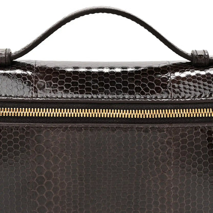 Loro Piana lizard leather pouch top edge with gold zipper and stitched handle attachment
