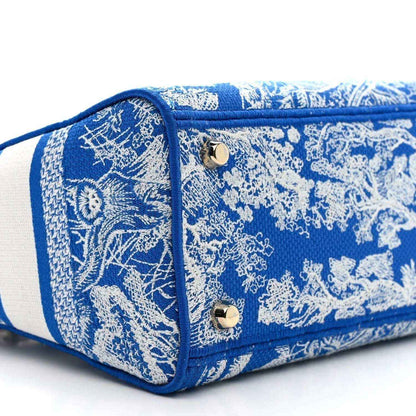 Dior tote bag side panel in blue Toile de Jouy print with two snap buttons