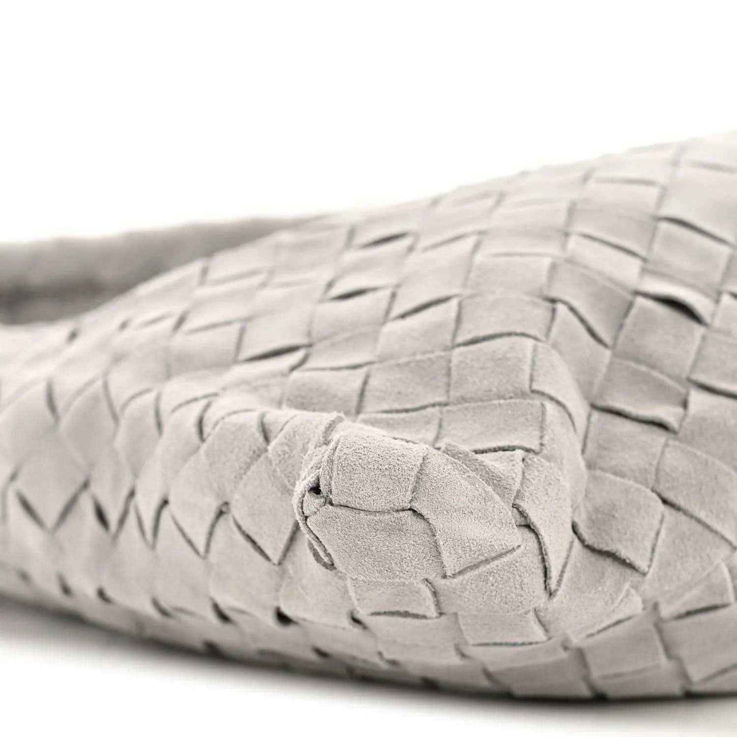 Sterling grey suede woven handle with knot-like clasp detail