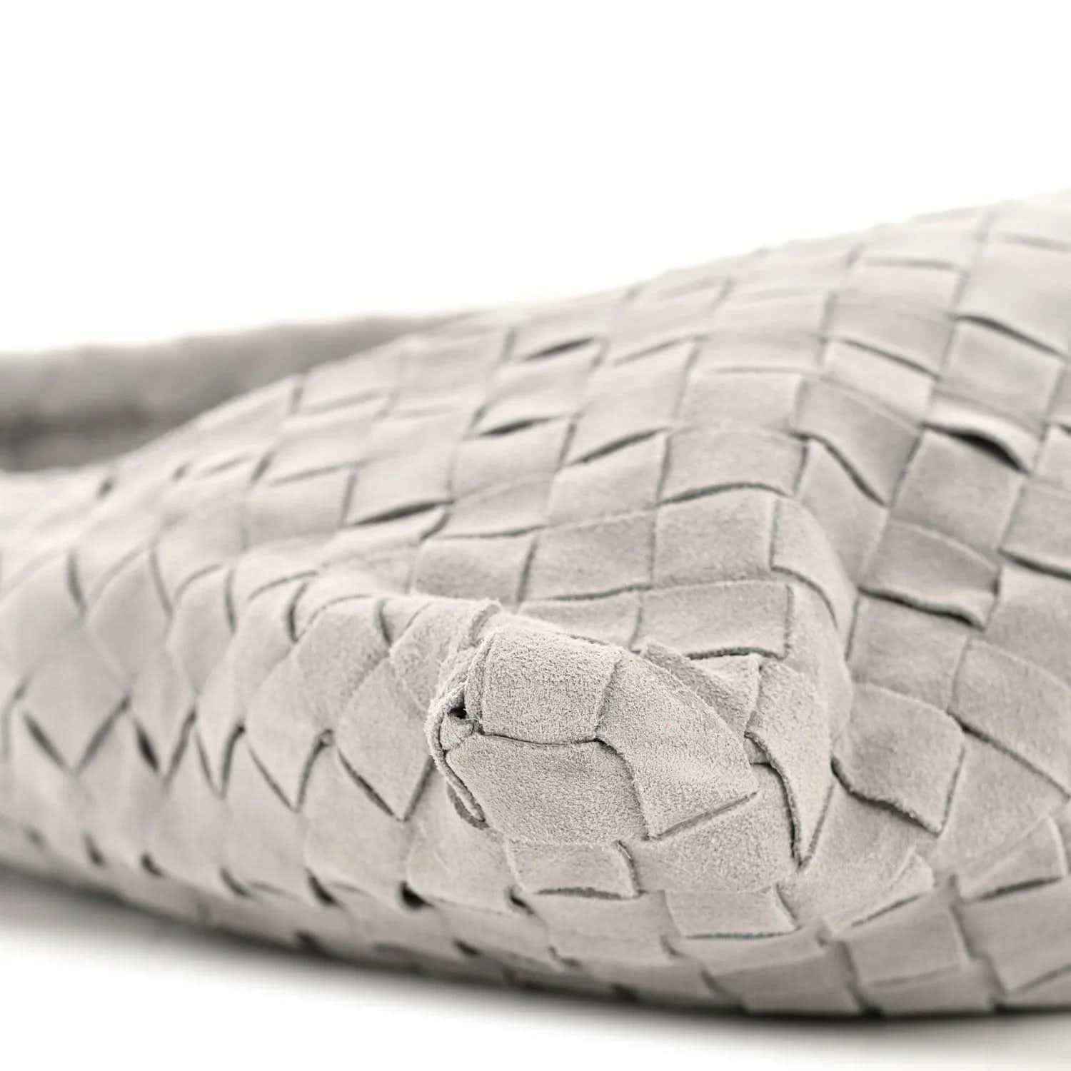 Sterling grey suede woven handle with knot-like clasp detail