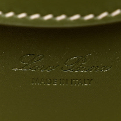 Olive green leather interior panel with embossed Loro Piana logo and MADE IN ITALY