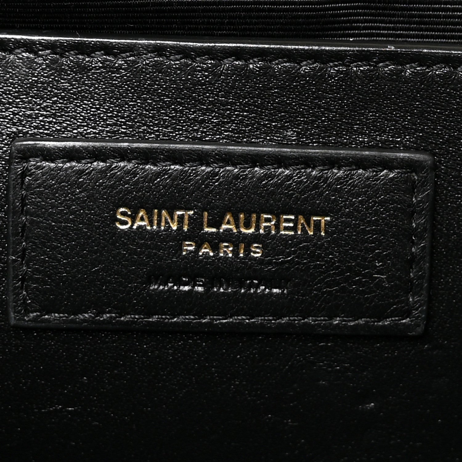 Saint Laurent Paris leather logo patch on black satchel lining