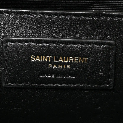 Saint Laurent Paris leather logo patch on black satchel lining