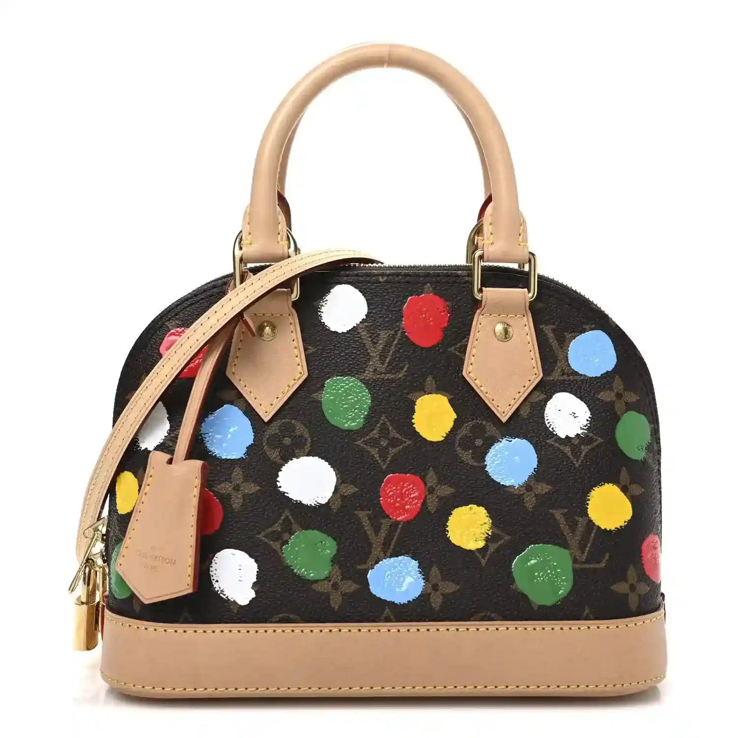 Small handbag with black canvas, multicolor dot print, tan leather top handles.