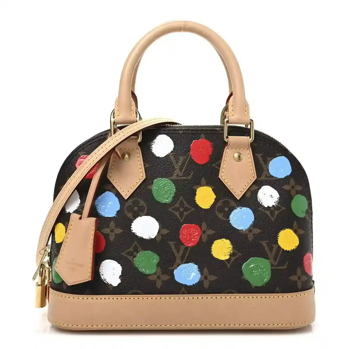 Small handbag with black canvas, multicolor dot print, tan leather top handles.