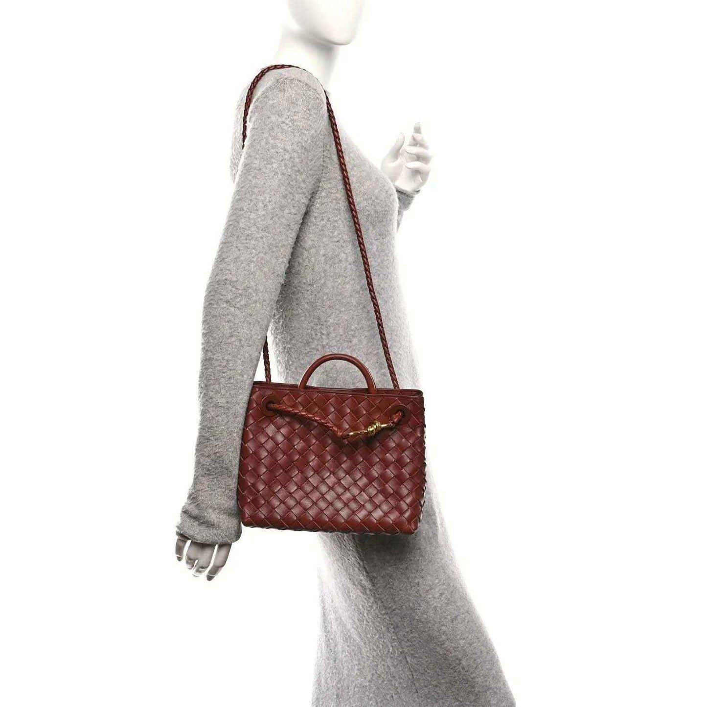 Small woven leather tote bag in Sapele brown, worn crossbody with short straps