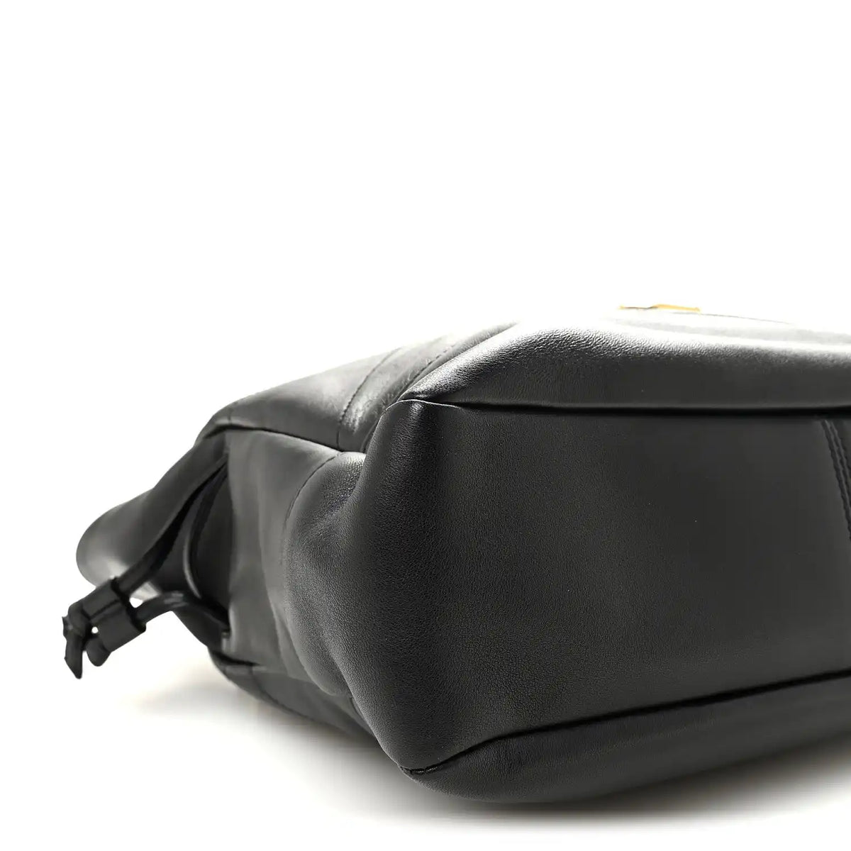 Black lambskin tote end view with braided drawstring bow and smooth leather base.