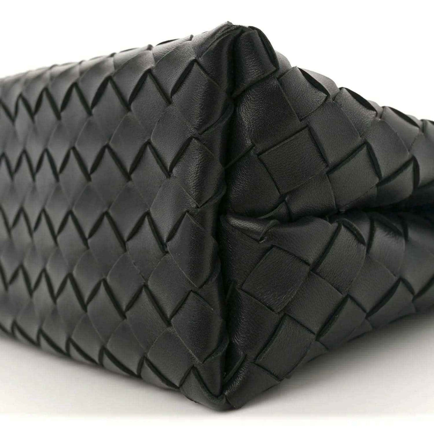 Black leather shoulder bag side with intrecciato weave and stitched folded panels