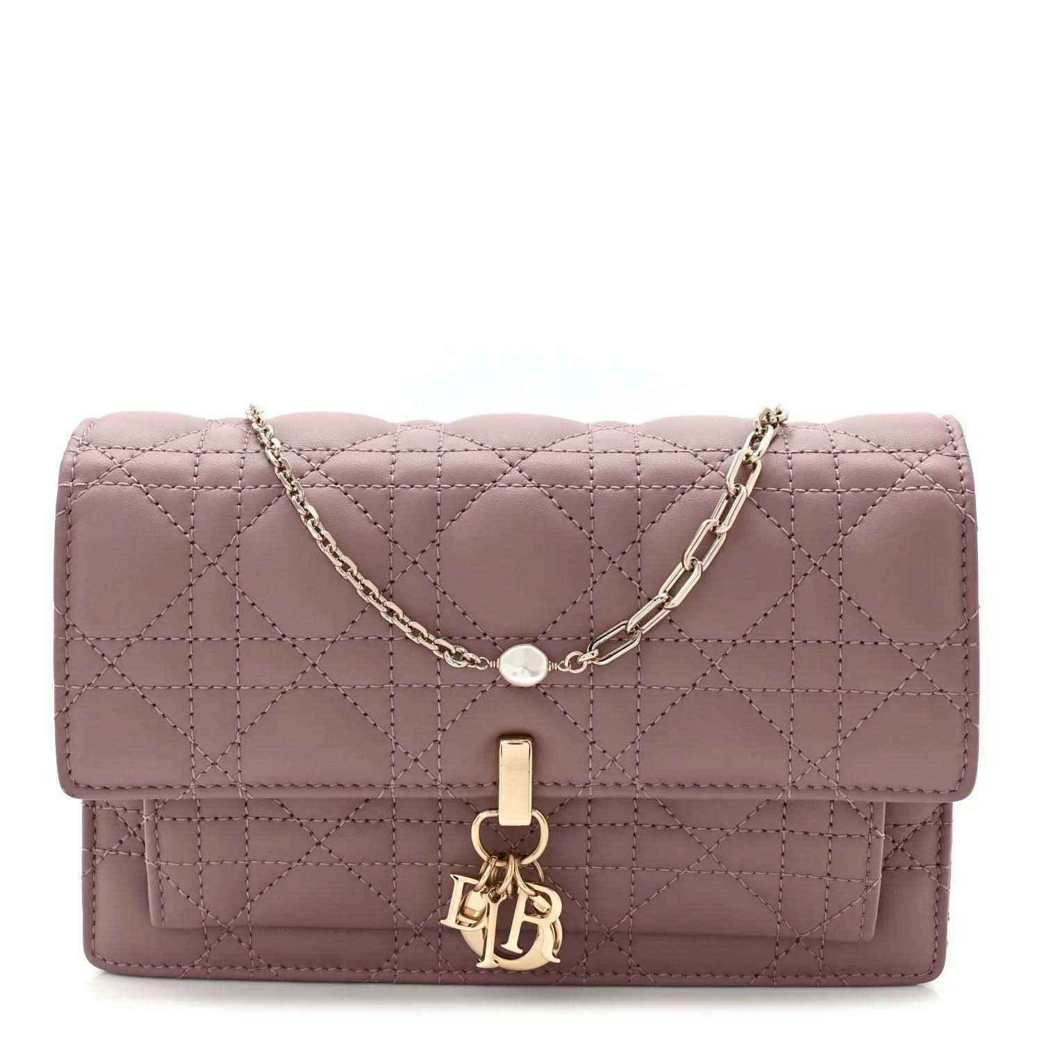 Purple quilted leather chain pouch bag with flap closure and gold-tone emblem hardware