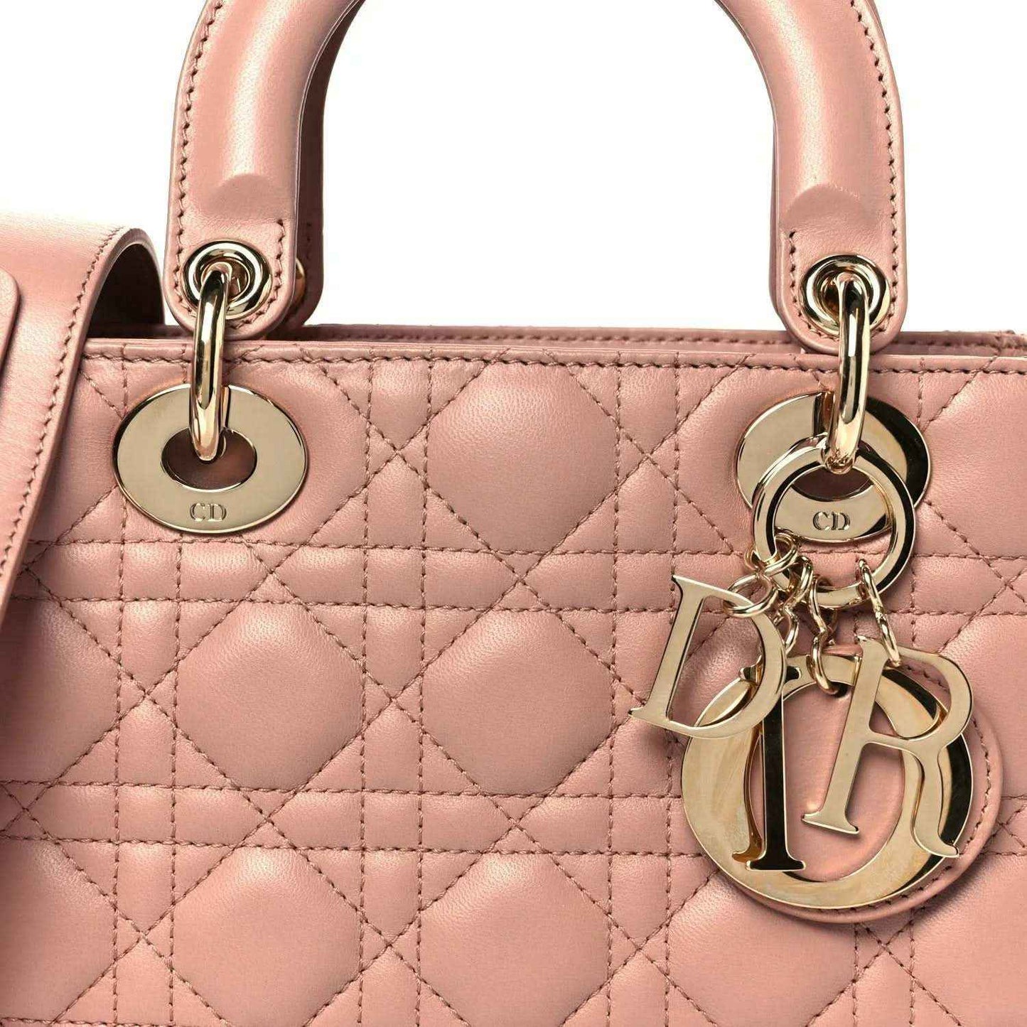 Quilted cannage front with top handles, gold-tone rings, and Dior charm