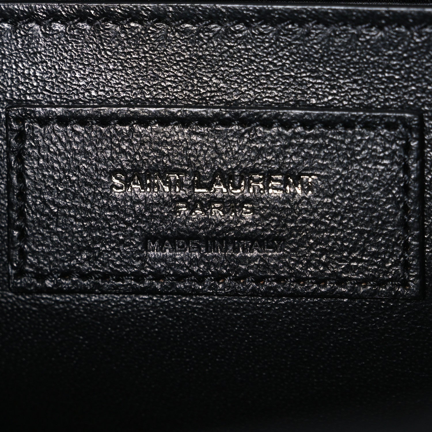 Saint Laurent black leather satchel label stamp on inner panel