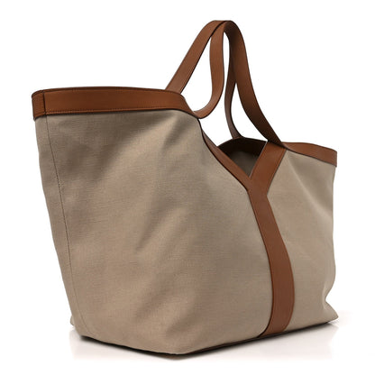 Canvas tote bag beige with brown leather handles and side panel, open top