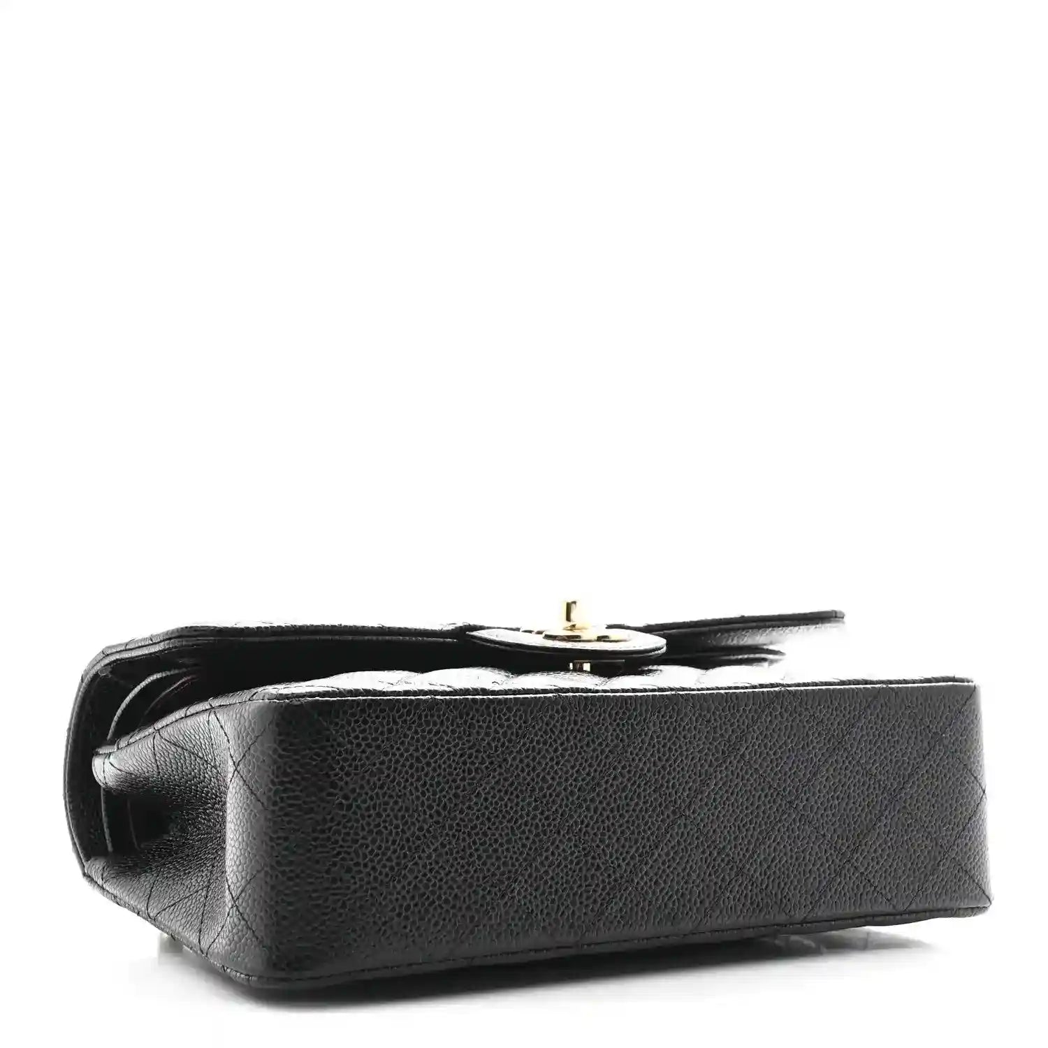 Chanel small double flap bag, black leather, side view with gold turn-lock hardware