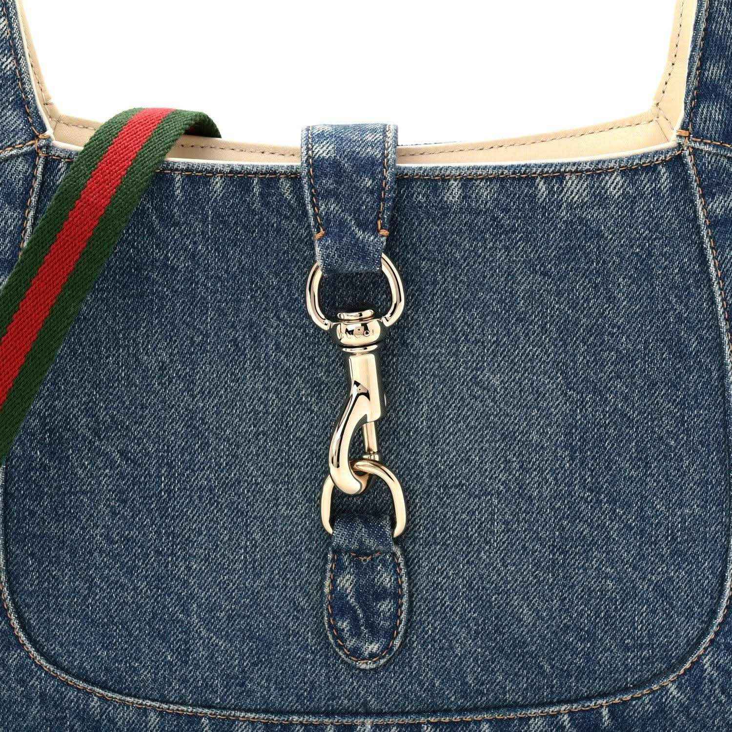 Blue denim Jackie bag front with gold-tone chain pull and red-green stripe