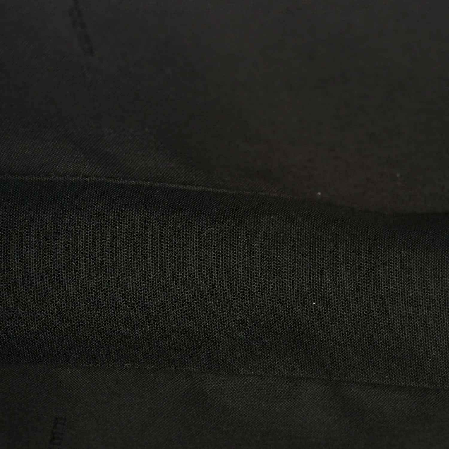Fendi baguette bag lining close-up in dark fabric with subtle texture
