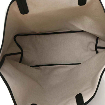 Goyardine Saint Louis PM tote interior with beige lining and black edging
