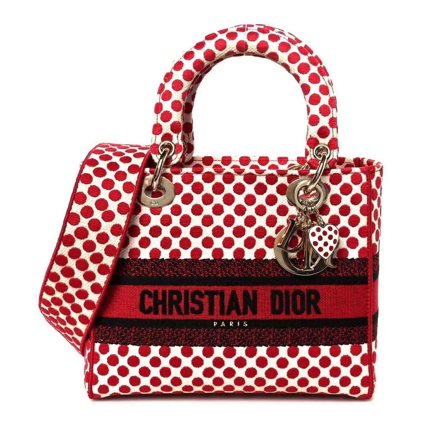Medium polka dot canvas bag in red and white with top handles and heart charm