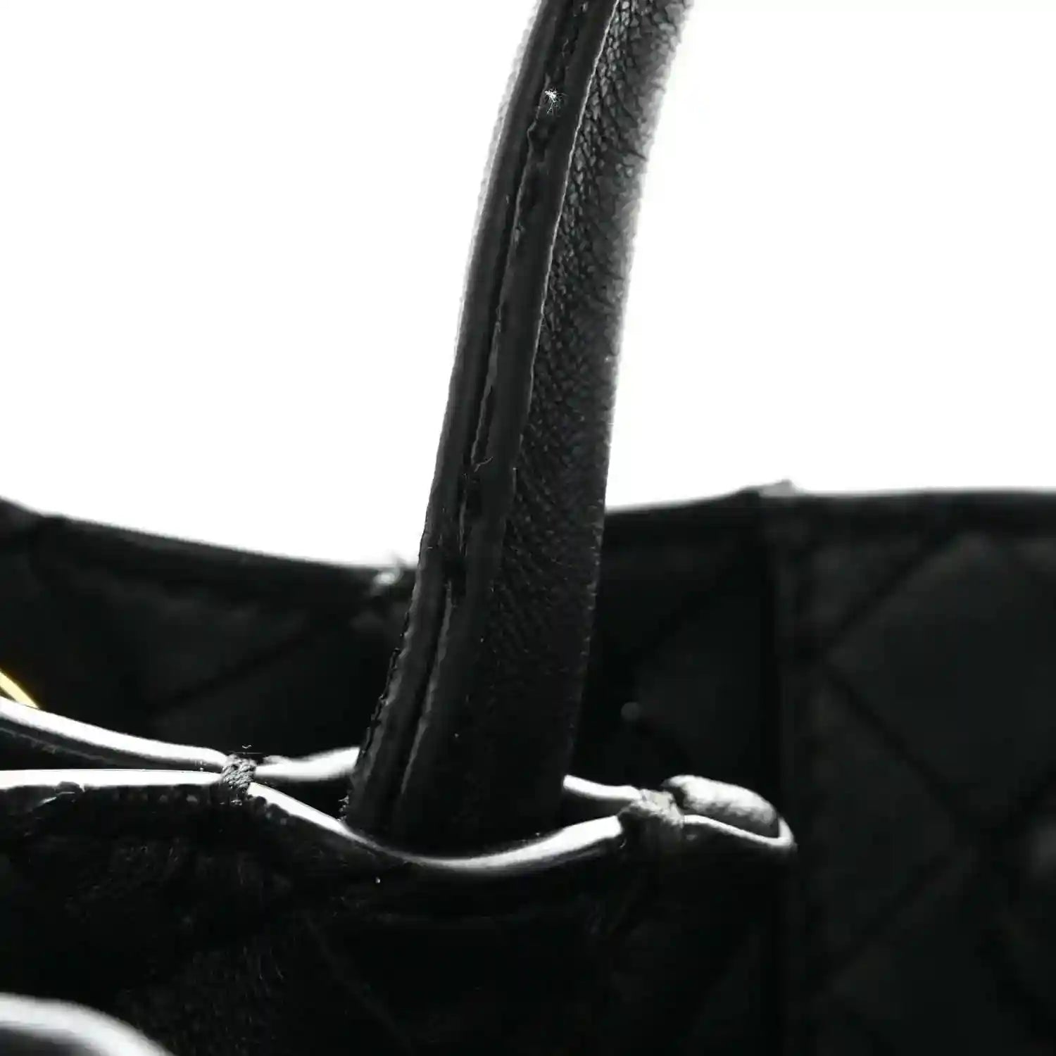 Black leather shoulder bag strap with intrecciato nappa weave and top edge detail