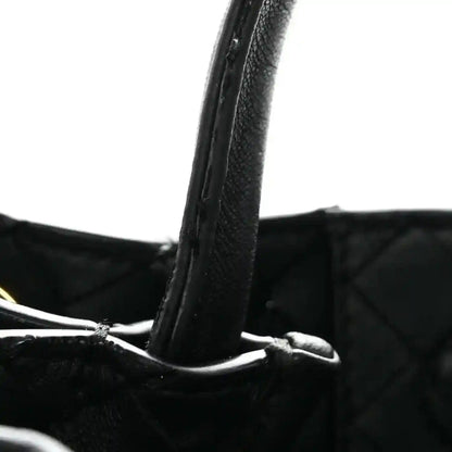 Black leather shoulder bag strap with intrecciato nappa weave and top edge detail