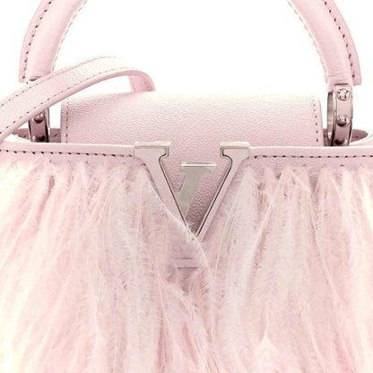 Louis Vuitton Capucines mini bag, pale pink leather with V-shaped front clasp and feathers